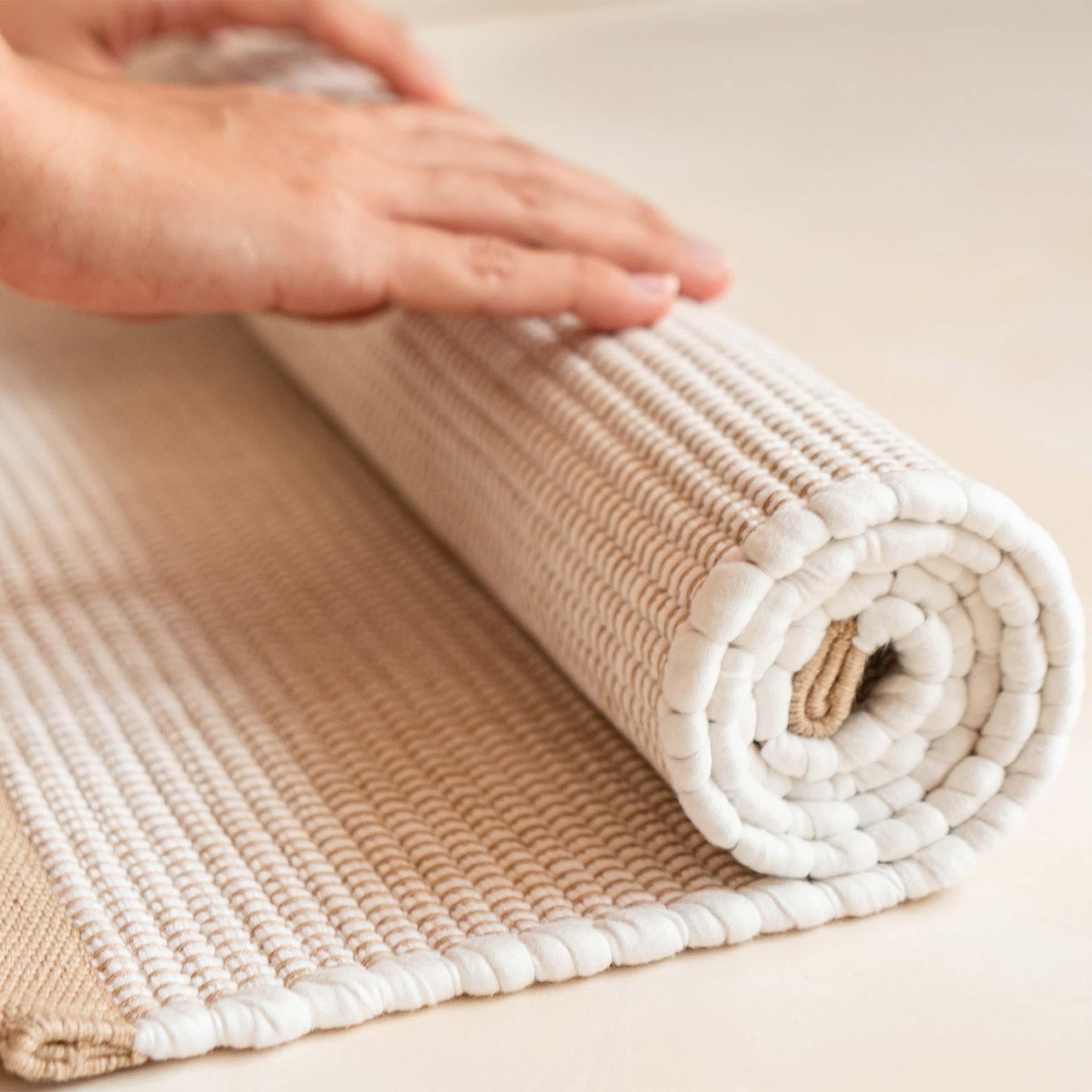 organic-cotton-floor-mats-rolled-up-in-white-colour-by-sojao