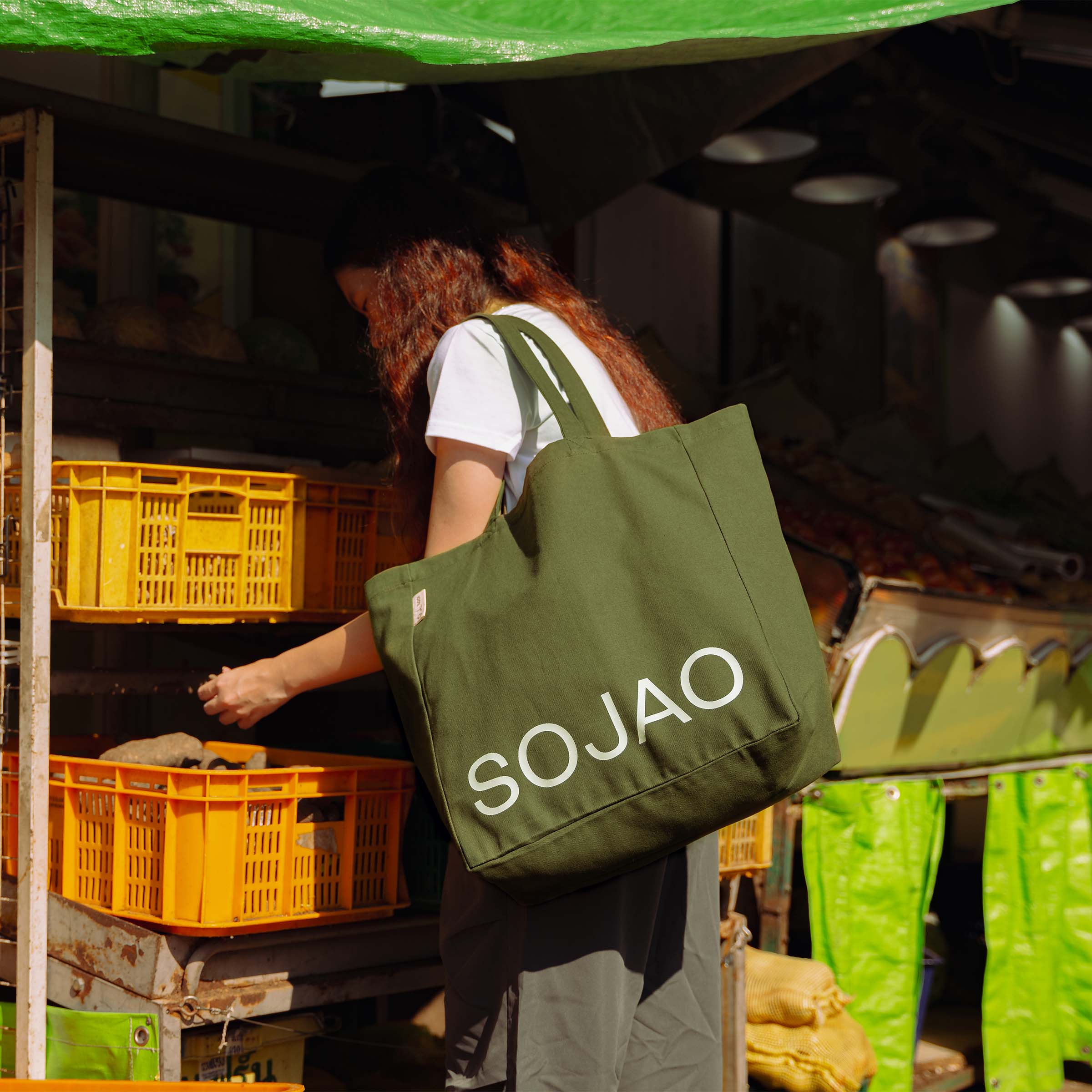 organic-cotton-SOJAO-tote-bag-in-olive-colour-carried-by-sojao