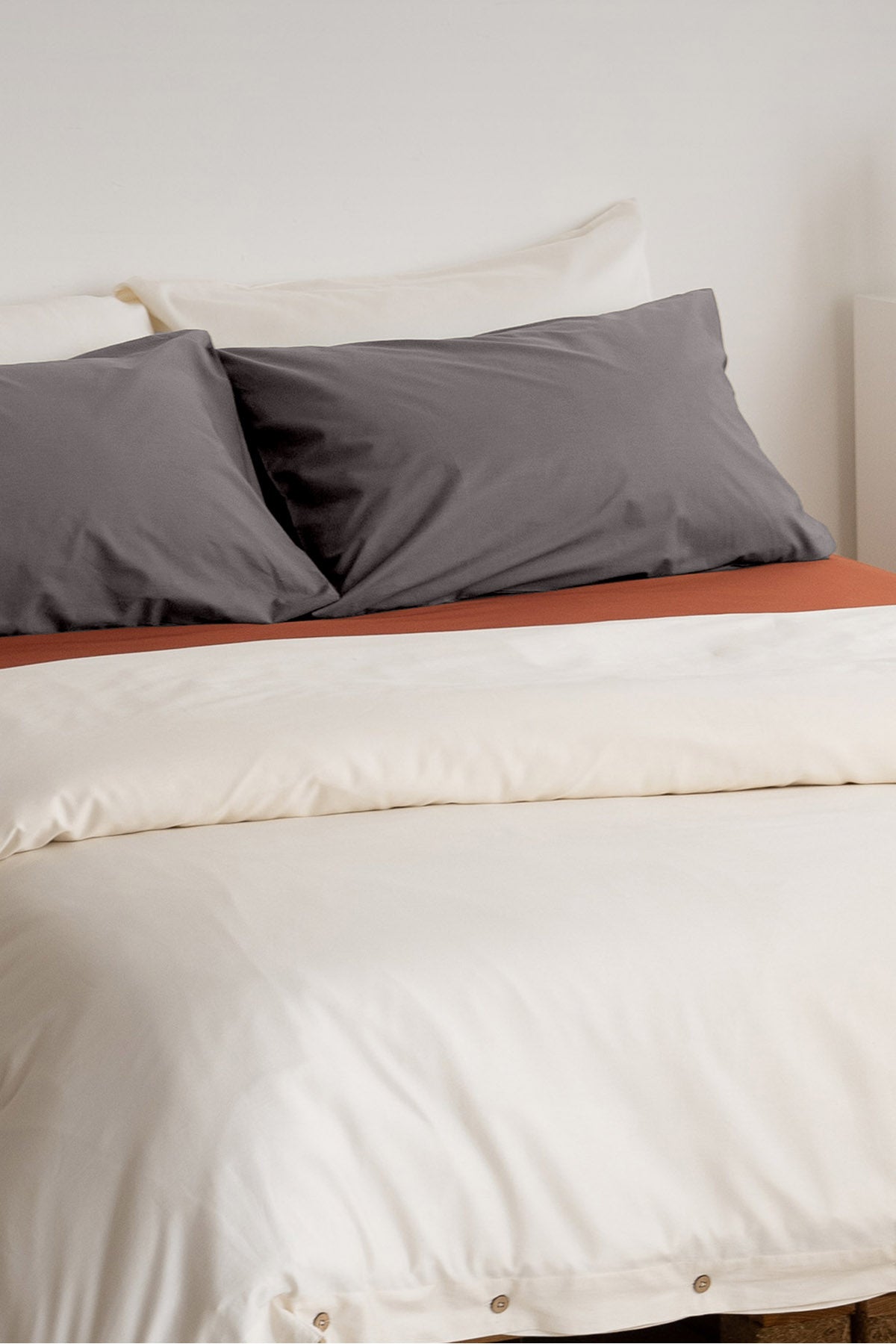 Classic Natural Duvet Cover paired with Classic Stone Pillow Case and Crisp Clay Fitted Sheet by SOJAO 