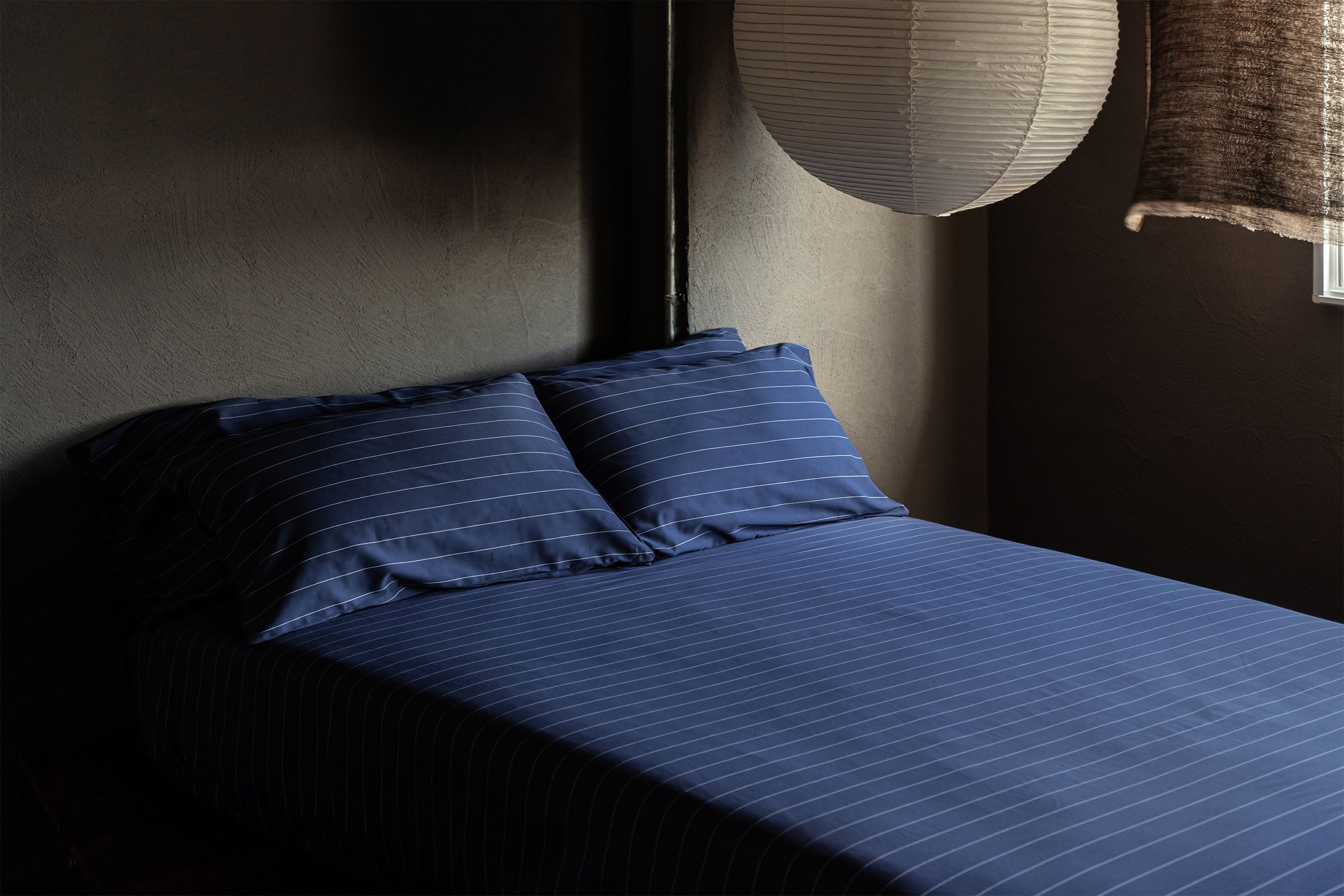 classic-navy-pinstripes-fitted sheet-moodshot-by-sojao.jpg