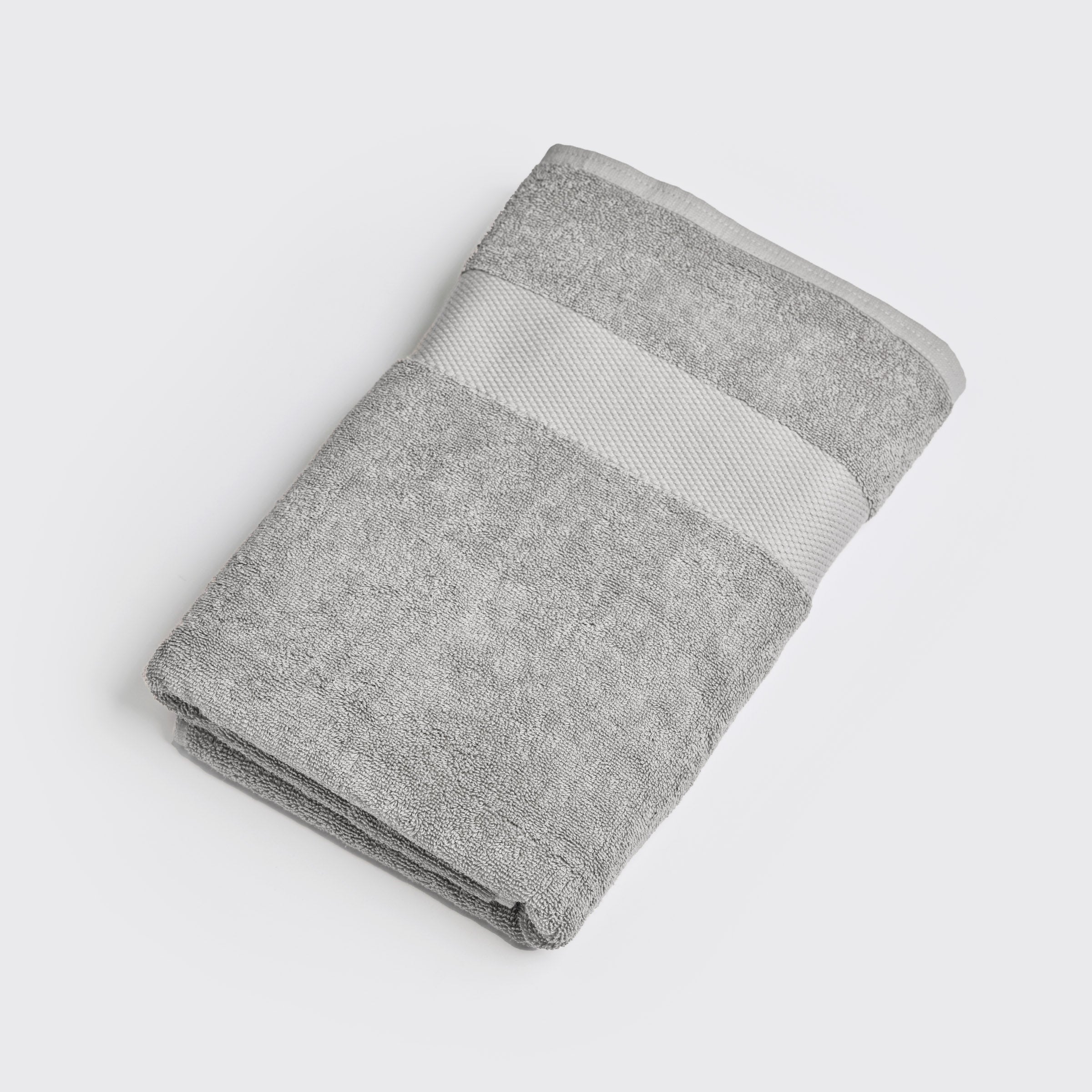 organic-cotton-bath-towel-in-stone-colour-folded-by-sojao