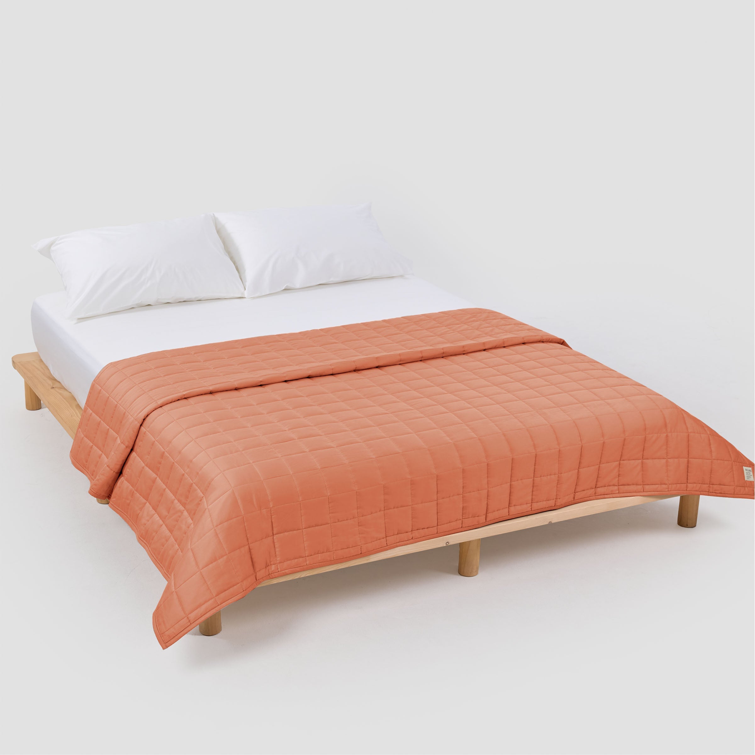 organic-cotton-quilt-in-peach-colour-by-sojao