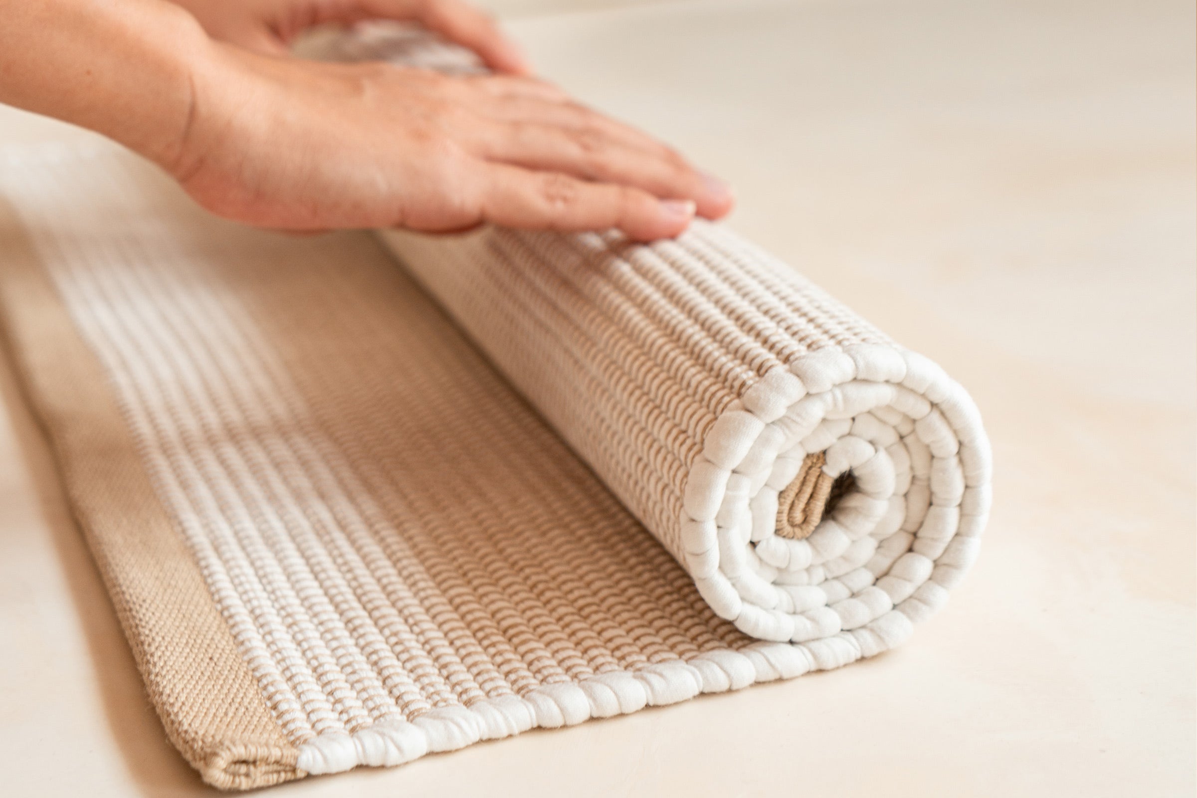 organic-cotton-floor-mats-rolled-up-in-white-colour-by-sojao