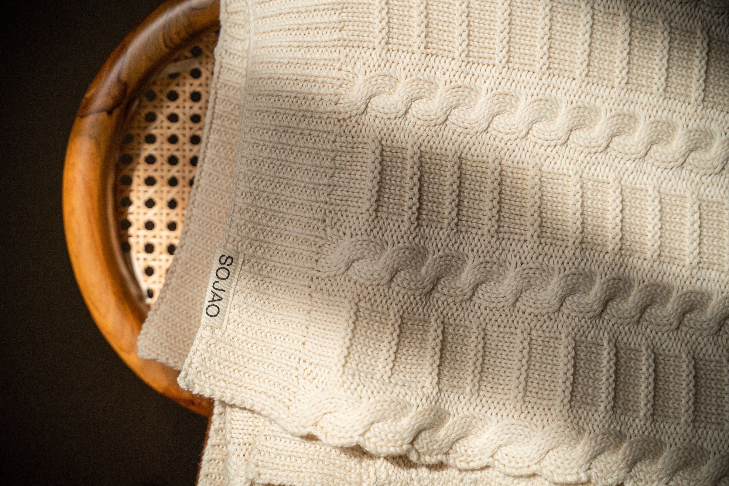 organic-cotton-cable-knit-throw-in-ivory-colour-with-SOJAO-tag-by-sojao
