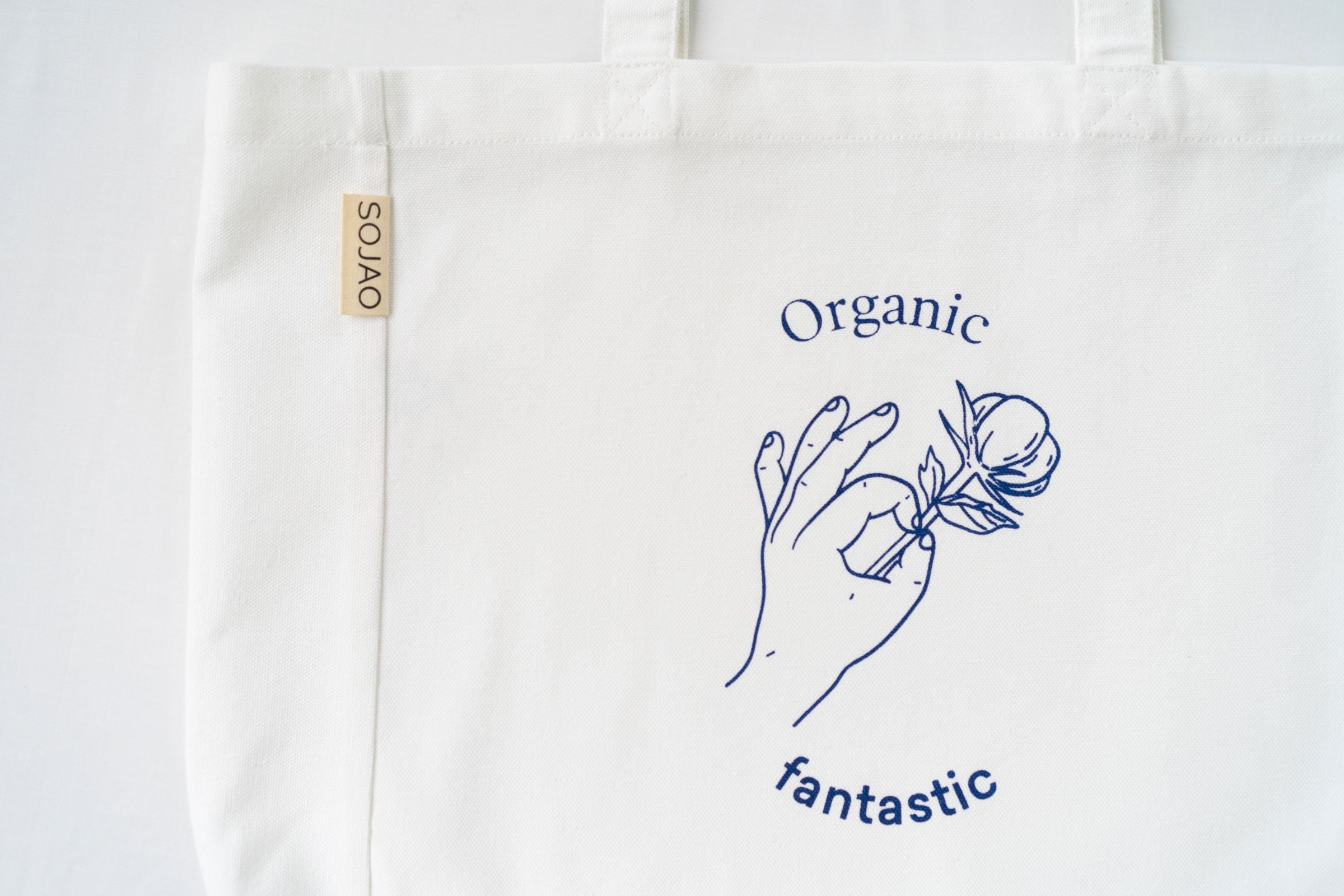 organic-cotton-tote-bag-in-white-colour-with-SOJAO-tag-by-sojao